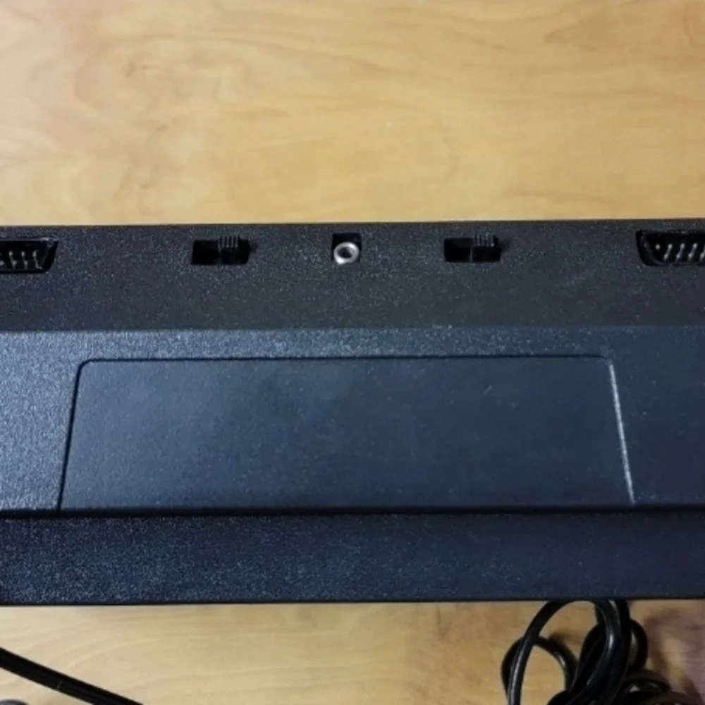 Atari Black Video Game Console with Controllers
